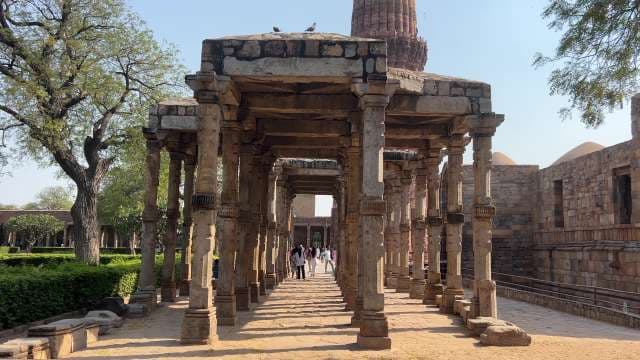 Ancient Stone Pillars at Qutb Complex in Delhi