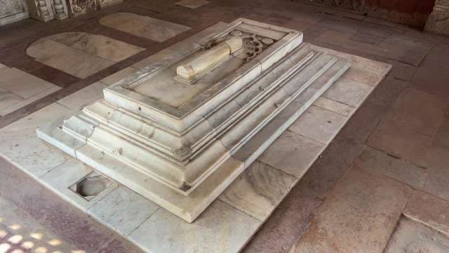 Intricately Carved Marble Tomb in Historic Monument