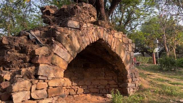 Archeological Park, Ancient Stone Archway Amidst Greenery - Delhi