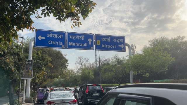 Delhi Traffic Near Okhla, Mehrauli, and Airport Road Signs