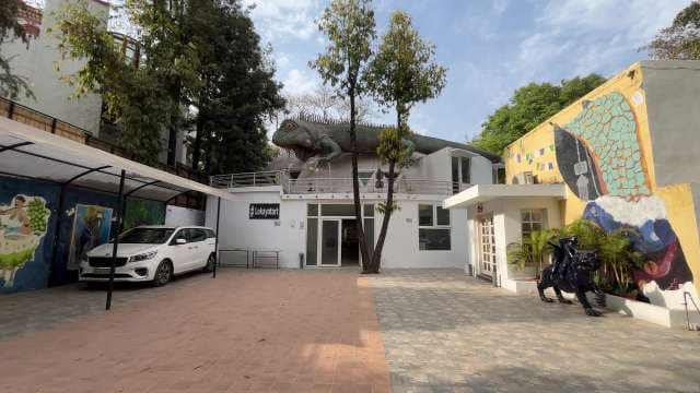 Lokayata Art Gallery Entrance With Iguana Sculpture in Delhi