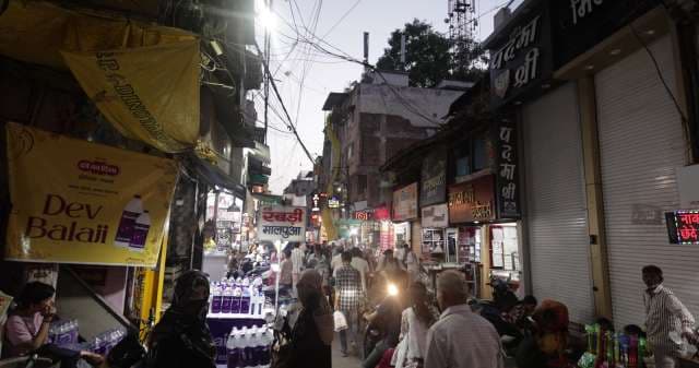 Busy Evening Market Scene in Old Delhi Street