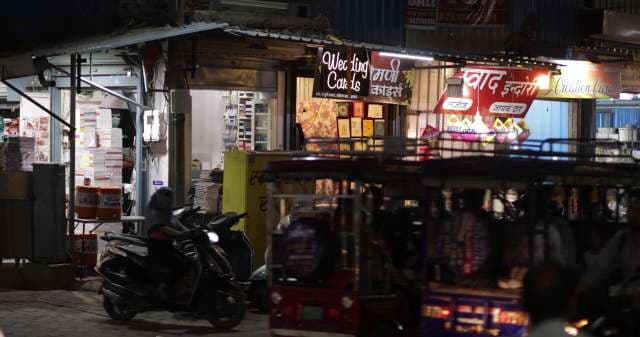 Night Street Scene at Wedding Card Shops in India