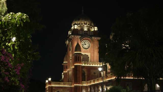 Illuminated Mahatma Gandhi Town Hall Tower at Night in Indore