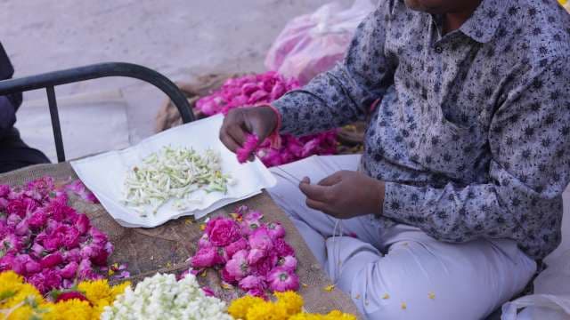 Crafting Fresh Flower Garlands at a Local Indian Market