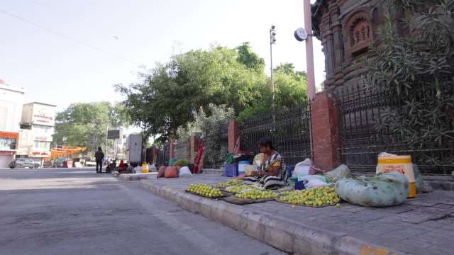 Street Fruit Vendor Selling Fresh Produce Near Historic Temple