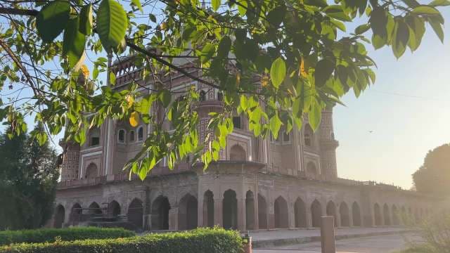 Sunlit View of Safdarjung Tomb Amidst Greenery