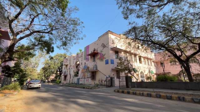 Colorful Street Art on Residential Building in Urban India