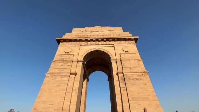 Majestic India Gate in New Delhi Against Clear Blue Sky