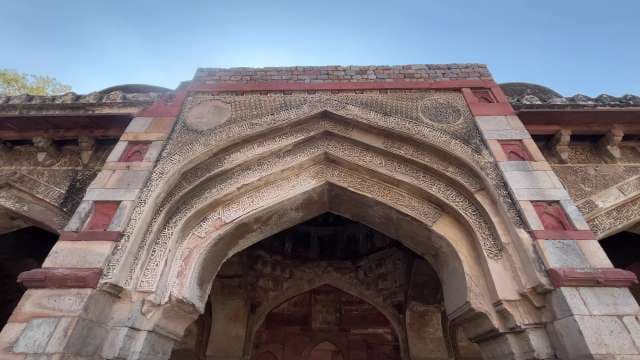 Ancient Islamic Archway with Intricate Stone Carvings