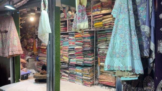 Vibrant Indian Ethnic Dress Shop Displayed With Colorful Fabrics