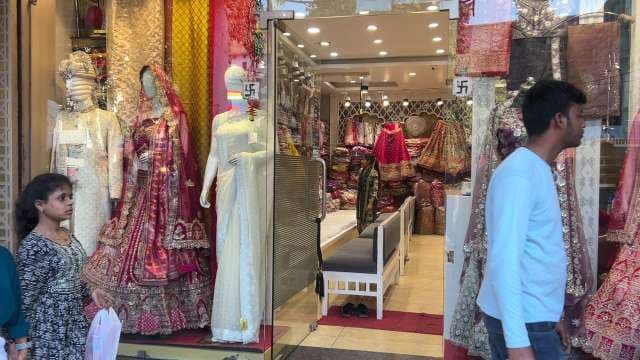 Traditional Indian Bridal Wear Displayed at Boutique Entrance