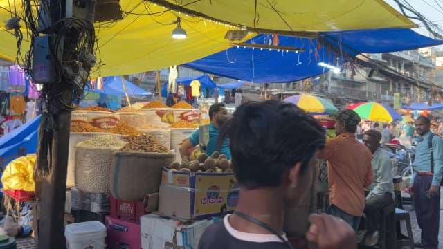Bustling Indian Spice Market With Colorful Stalls and Vendors