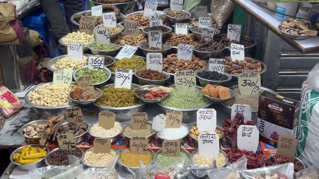 Vibrant Indian Spice and Dry Fruit Market Display in Delhi
