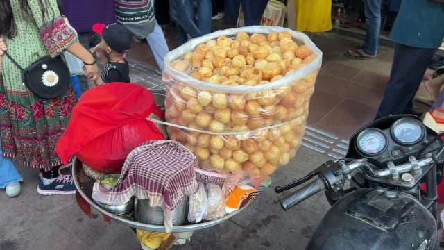 Street Vendor Selling Fresh Pani Puri in Busy Market