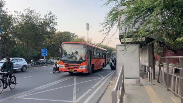 Delhi City Bus Arrives at Nehru Stadium Stop
