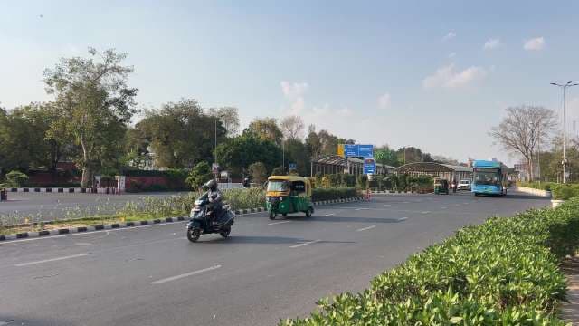 Sunny Day Traffic on New Delhi City Road