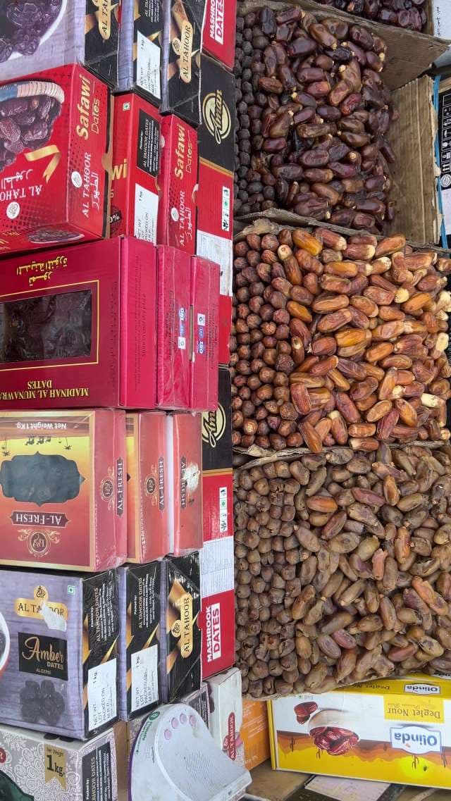 Varieties of Dates on Display at Local Market Stall