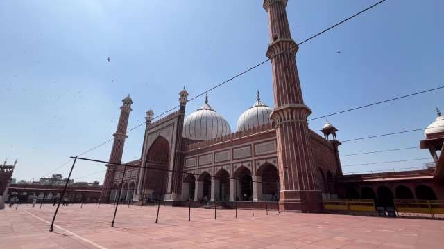 Jama Masjid Delhi: Majestic Mughal Mosque Under Blue Sky