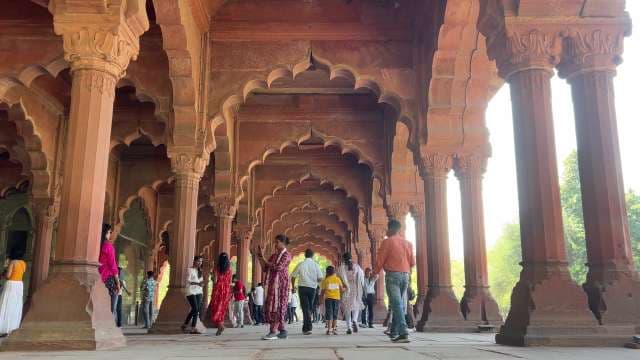 Visitors Explore Iconic Arches at Delhi's Red Fort