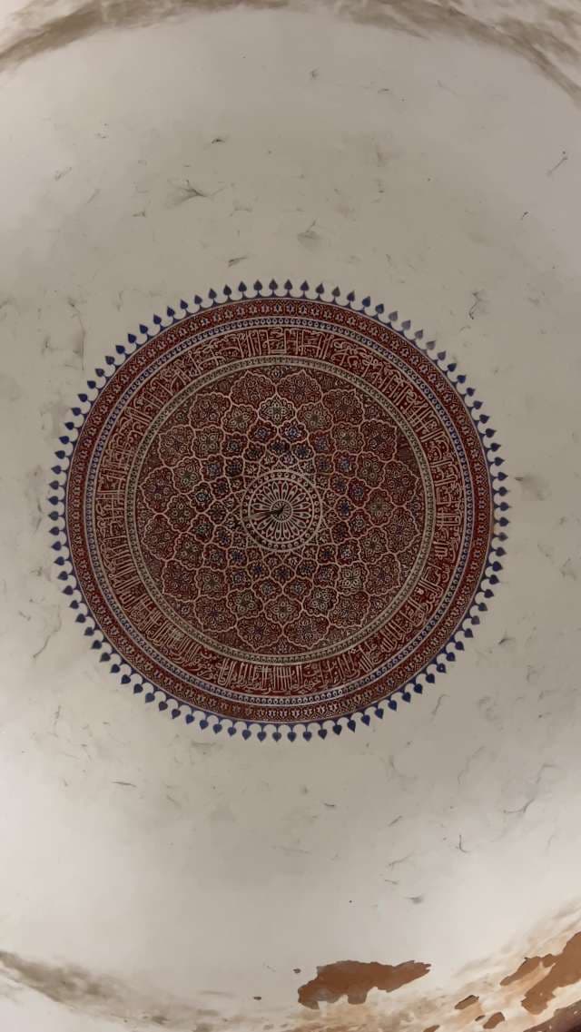Intricate Islamic Geometric Pattern Ceiling Art in Mosque Dome