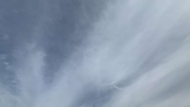 Dramatic Blue Sky With Wispy Clouds