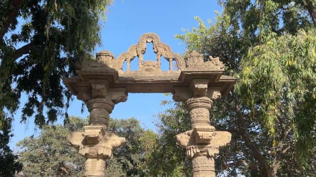 Ancient Stone Archway with Ornate Carvings in India