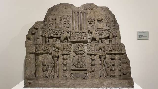 Ancient Indian Stone Relief with Animal and Floral Motifs