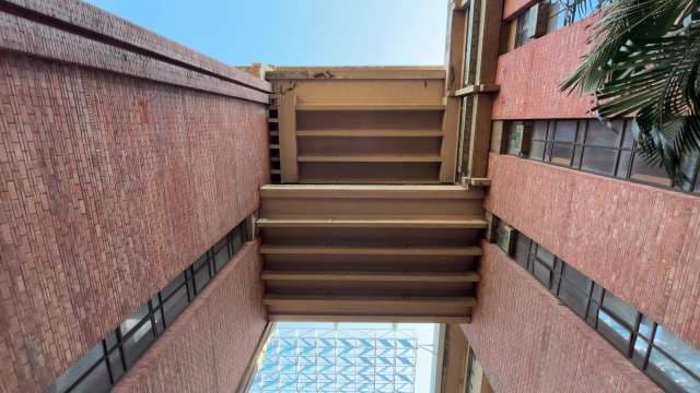Modern Brick Architecture With Geometric Overhangs
