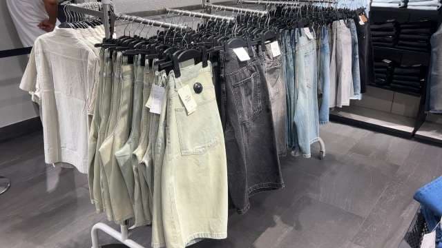 Trendy Denim Shorts Collection Displayed in Fashion Store