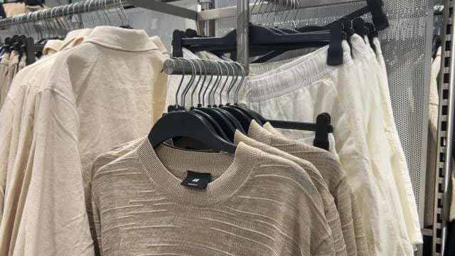 Neutral Tone Clothing Collection on Display in Store