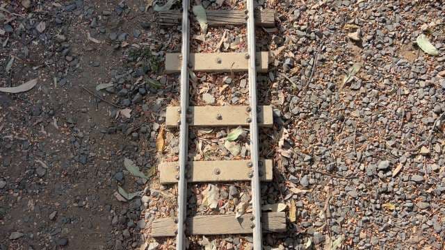 Close-Up View of Miniature Railway Track Structure
