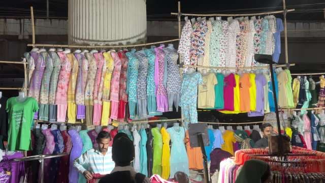 Vibrant Fashion Stalls at Night Street Market