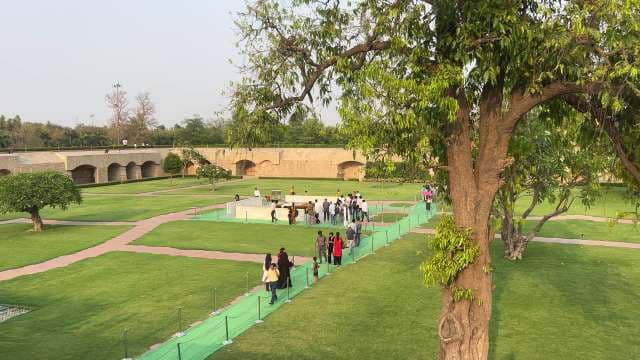 Visitors Explore Gandhi Smriti Memorial Gardens in New Delhi