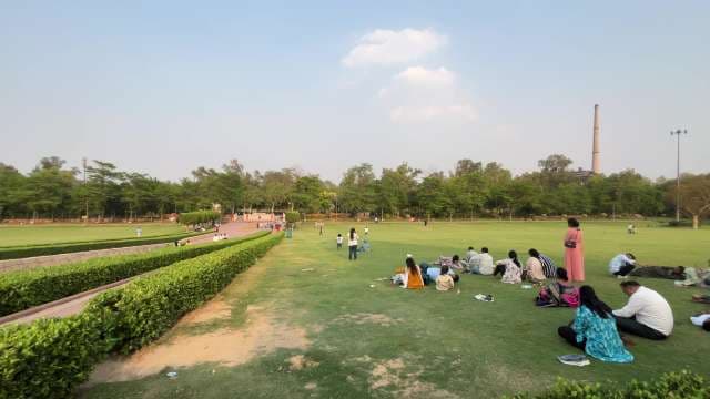 Relaxing Afternoon in City Park With Families and Friends