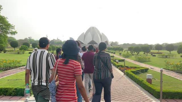Visitors Approach the Iconic Lotus Temple in Delhi
