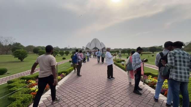 Visitors Exploring the Iconic Lotus Temple in Delhi