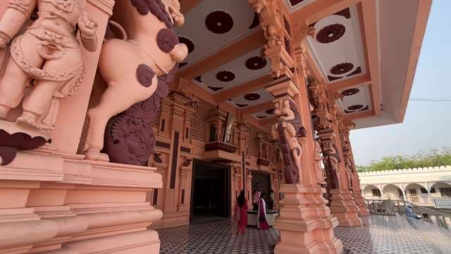 Intricate South Indian Temple Entrance With Sculpted Pillars