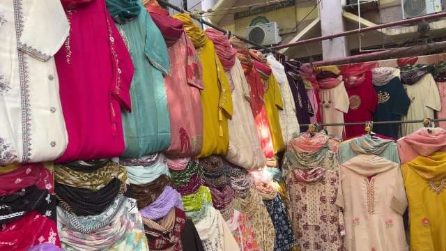 Vibrant Indian Salwar Kameez Display at Local Market
