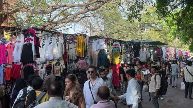 Bustling Street Shopping Scene at Sarojini Nagar Market Delhi