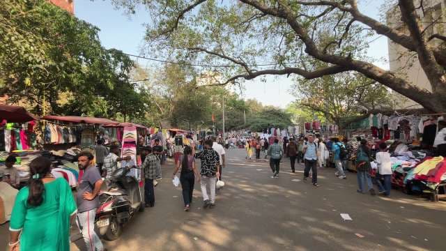 Busy Janpath Market With Clothing Stalls and Crowds in India