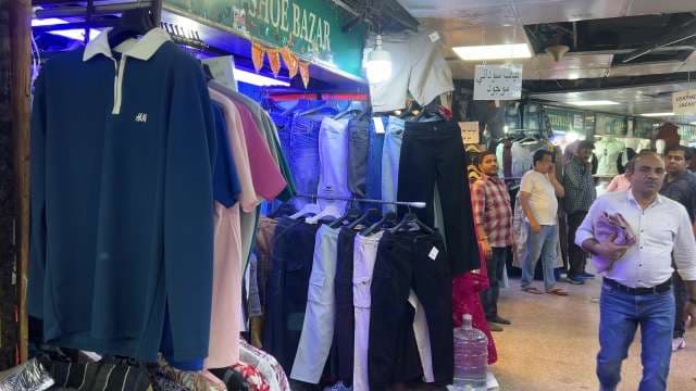Bustling Shopping Scene at Shoe Bazar Clothing Market