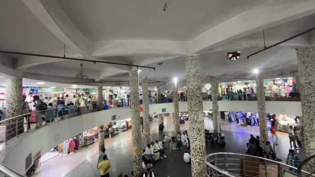 Bustling Indoor Market Filled With Shoppers and Local Stalls