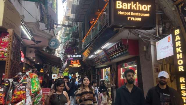 Bustling Barkhor Street Market Experience in Delhi Alley