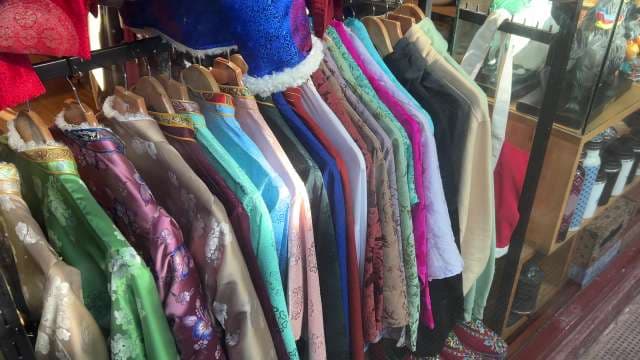 Vibrant Traditional Hanbok Display in Storefront