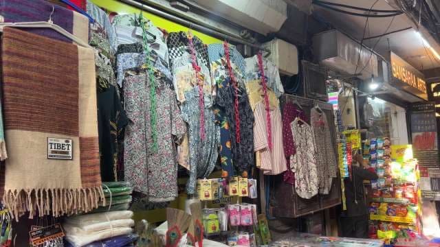 Colorful Street Market With Traditional Clothing and Souvenirs