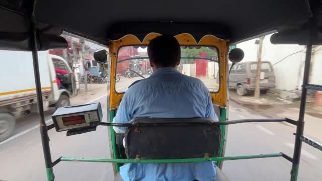 Rickshaw Ride Through Bustling Streets of India