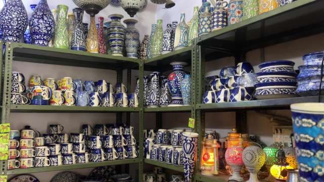 Colorful Jaipur Blue Pottery Display in Artisan Shop