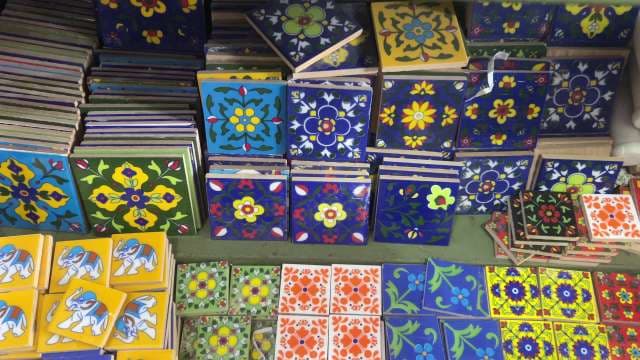 Colorful Handcrafted Ceramic Tiles Displayed for Sale