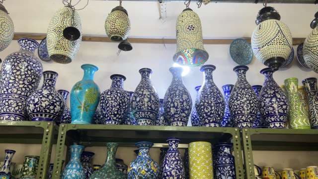 Exquisite Blue Pottery Vases and Mosaic Lamps Displayed